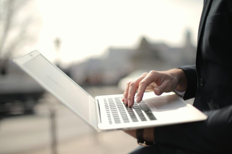 Person Using Macbook Air